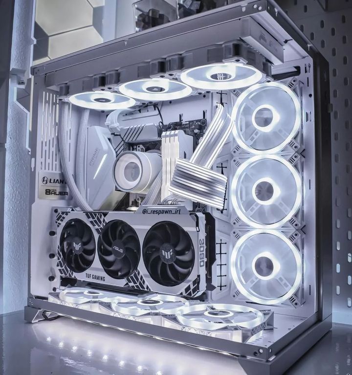 the inside of a computer case with several fans and lights on it's sides