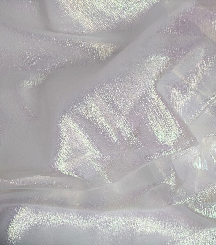 Crafted to redefine elegance, Glitterbug Crinkle Pearlized Sheers offer a unique blend of sheer texture and a sophisticated pearlized finish This crinkled pearly sheer fabric is not just any ordinary fabric, but it's a style statement on its own Perfect for fashion - forward individuals, this fabric paves the way to creating trendy skirts, modish tops, stylish dresses, and chic scarves Its versatility doesn't end there; it can be incorporated into various special occasion apparel projects that d Fabrics Aesthetic, Labyrinth Dress, Frozen Fashion, Fabrics Texture, Sheer Texture, Iphone Wallpaper Vsco, Curtains Sheer, Tops Stylish, Chic Scarves