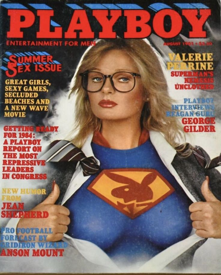 a magazine cover with a woman wearing a superman costume