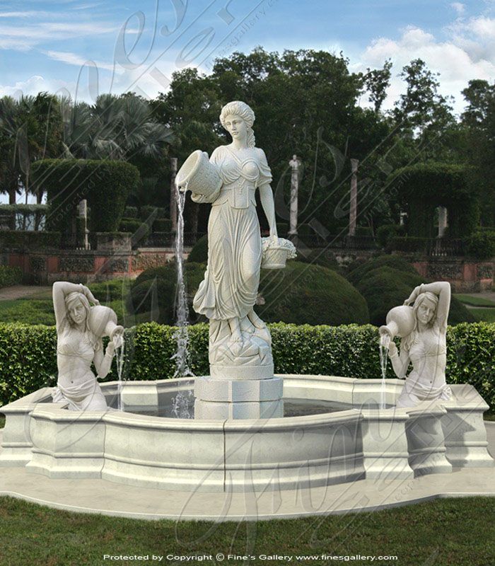 a statue in the middle of a fountain surrounded by hedges and bushes with water running from it