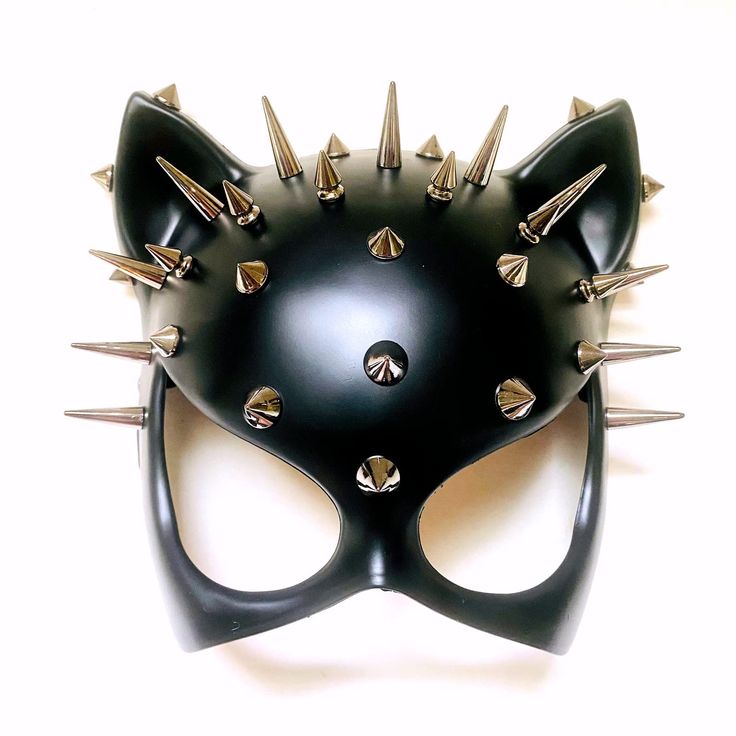 PRICES MAY VARY. Cat woman masquerade ball mask Quality Resin base and 100% hand painted color Measurment approximately :7"x6" fit most of adult women and teen girls Spike cat masquerade ball mask The cat woman masquerade mask is beautifully crafted from quality resin with metallic silver spikes and hand painted Finished with Elastic band for comfortable wearing; This sophisticated mask is stunning and it's perfect for your Halloween cosplay party, parade night party, Carnival, movie, photo shoo Cat Woman Dress, Cat Woman Mask, Cat Masquerade Mask, Circus Clothing, Halloween Couples Costumes, Woman Mask, Gold Masquerade Mask, Masquerade Ball Mask, Jinkx Monsoon