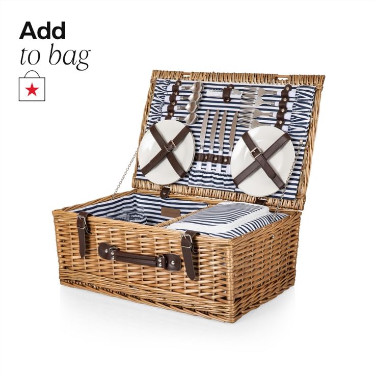 an open wicker suitcase with black and white stripes