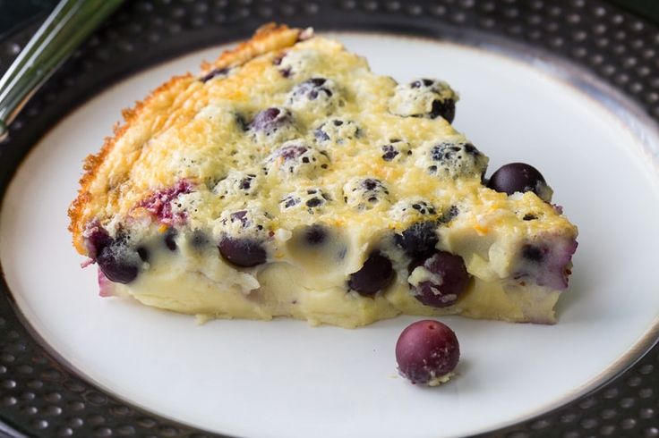 a slice of blueberry cheesecake on a plate