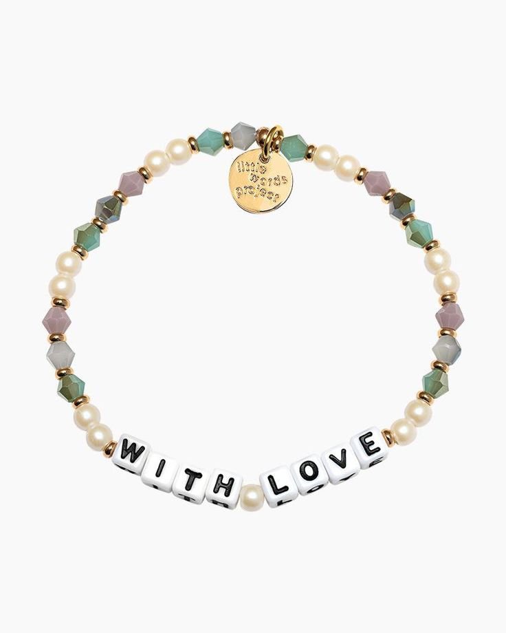 Add a pop of style and sentiment to your wrist with this stunning Little Words Project bracelet! Its eye-catching design and message spelled out in letter beads make it a great choice for your bracelet stack. Letter beads spell out "WITH LOVE" S/M size elastic stretch bracelet Hand-crafted beaded bracelet Plated brass hardware Handle with care - do not wet Due to the one-of-a-kind nature of the medium, exact colors and patterns may vary slightly from the image shown Trendy Heart Bracelet With Letter Beads, Trendy Heart-shaped Bracelets With Letter Beads, Heart-shaped Letter Beads Bracelet, Trendy Heart-shaped Stretch Bracelet With Letter Beads, White Heart-shaped Stretch Bracelet With Letter Beads, Erin Gray, Trendy Bracelets, Shoes Sandals Heels, Letter Beads