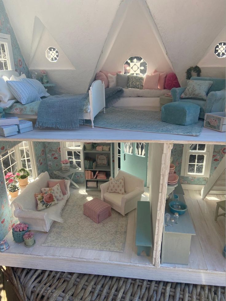 a doll house is shown with furniture and accessories in the living room, bedroom, and bathroom