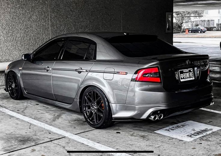 a silver car parked in a parking garage