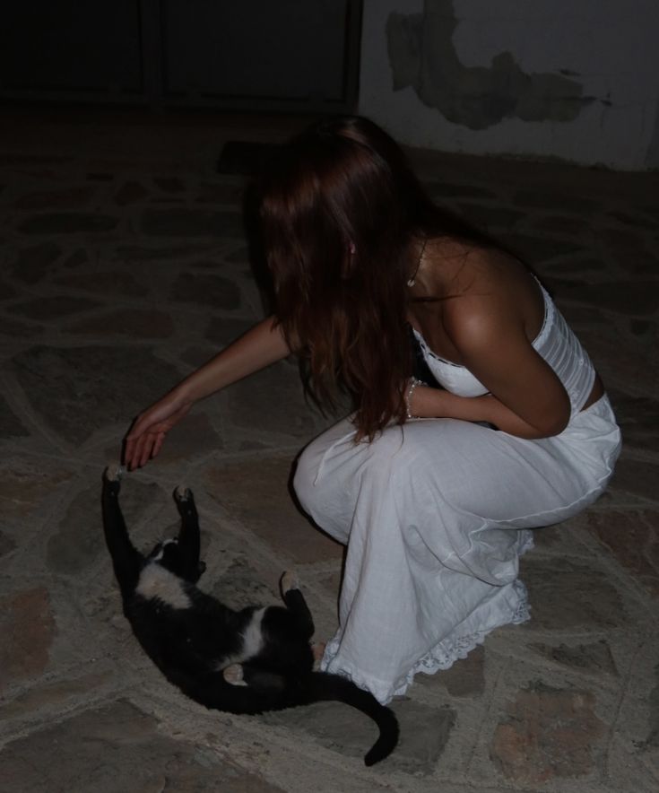 Girl playing with cat at night, white skirt, white top, black cat, nightlife in Greece Greek Summer Aesthetic, Summer Nights Aesthetic, Nights Aesthetic, Greece Girl, Europe Summer Outfits, Greek Beauty, Greek Summer, Greek Women, Greece Photography