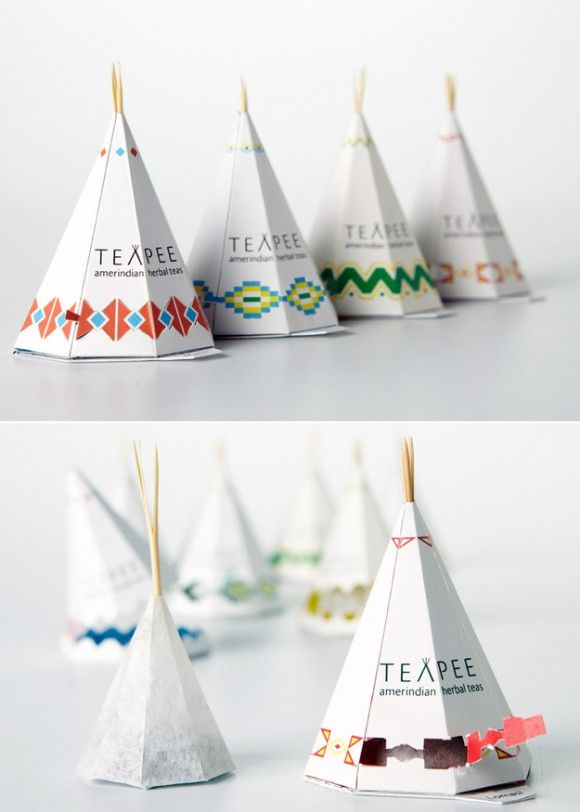 several small paper teepees are lined up