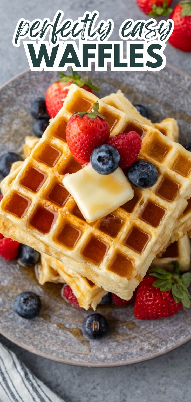 An overhead view of a stack of 3 waffles topped with a pat of butter, fresh strawberries and blueberries, and drizzled with maple syrup. Waffle Banana Recipe, Waffle Iron Recipe, Quick Waffle Recipe, Homemade Waffles Easy, Make Ahead Waffle Batter, Homemade Waffle Mix Easy, Homemade Waffle Batter, Diy Waffle Mix Recipes, Waffle Recipe No Eggs