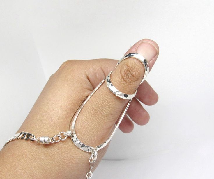 "The Thumb MCP Sterling Silver Splint Ring with hammered finish helps to block hyperextension of the MCP joint and the thumbs knuckle, it comes without or with a bracelet, you can select the option in the drop down menu. -Use on thumbs that hyperextend at the MCP -Use if you have at least 25 degrees of MCP flexion - IMPORTANT, PLEASE READ This splint is considered a CUSTOM ORDER, we strongly recommend measuring using the correct measuring tool, a standard ring sizer, to get a good fit. Each spli Thumb Splint, Silver Swan, Ring Sizer, Agate Gemstone, Ring Ring, Perfect Ring, Adjustable Rings, Jewelry Stores, Fashion Rings