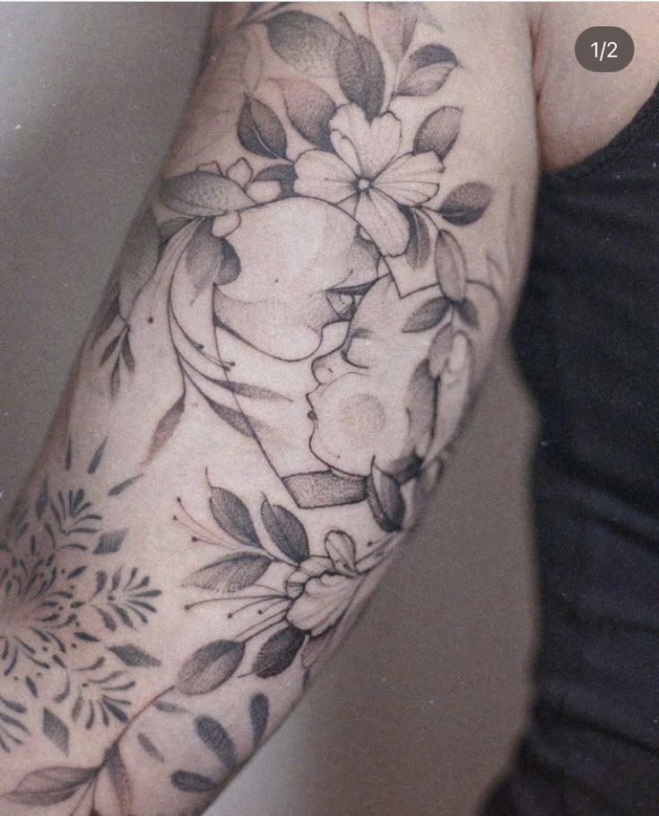 a person with a flower tattoo on their arm