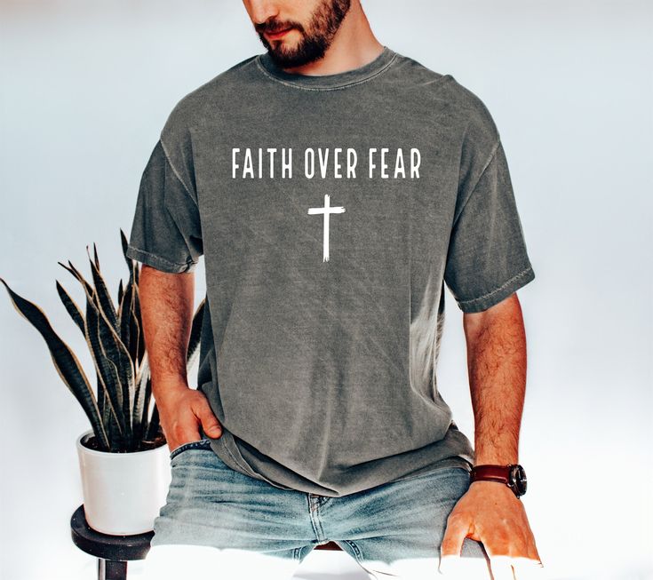 Faith Over Fear T-Shirt, Church Shirt, Christian Gift Tee, Religious Shirts, Bible Verse, Jesus Lover, Faith, Inspirational, Comfort Colors 🌿WELCOME TO UNIQUE TRENDS DESIGN  If you are looking for soft, comfy, first-rate t-shirts, you're in the right place! Here at Unique Trends Design, we love what we do and strive to make your shopping experience just right for you. If you have any questions, concerns, or comments about our products, feel free to shoot us a message anytime. Even on weekends and holidays, we'll try our best to respond as quickly as possible! 🌿Product Details  Unisex T-Shirt: - Comfort Colors Brand - 100% cotton - Light/medium weight and extremely soft, this shirt is sure to be your next favorite t-shirt. 🌿Sizing and Coloring  Please make sure you select the right color Cross Tee Shirt, Bible Shirt, Christian Clothes, Bible Verse Tees, Bible Shirts, Church Shirt, Easter Religious, King Shirt, Christian Tees