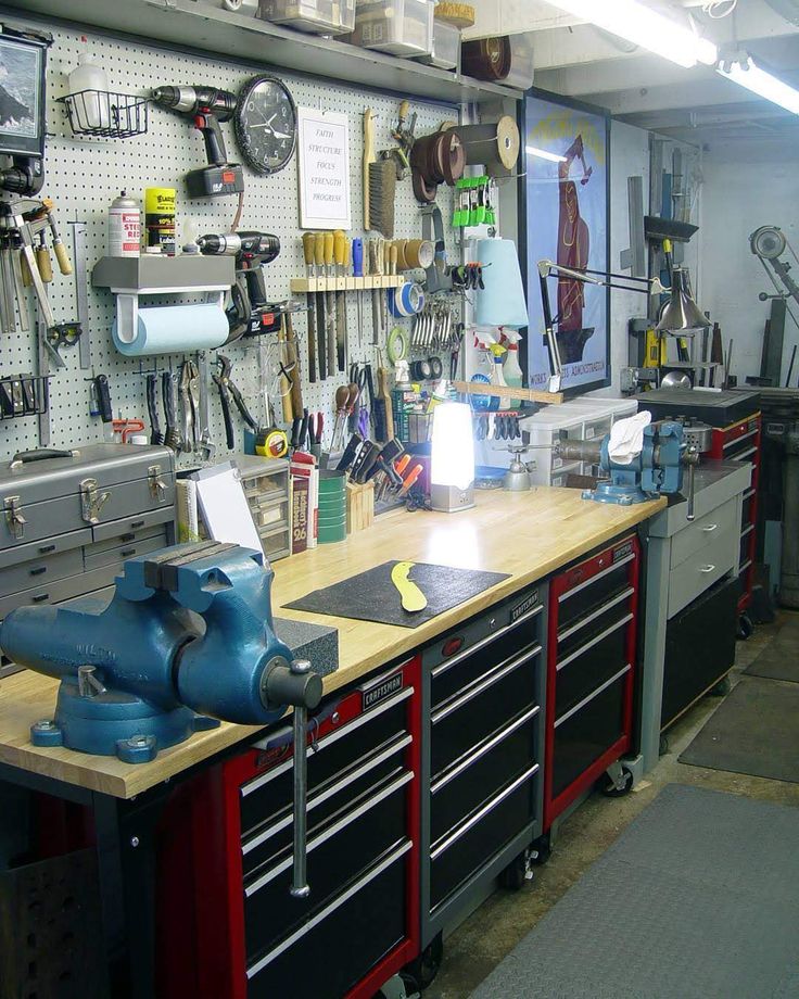 a workbench with lots of tools on it