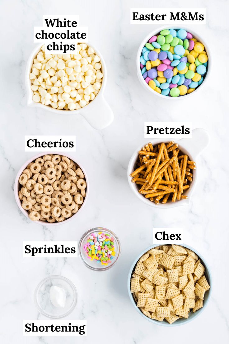 different types of cereal in bowls on a white marble counter top with words describing their names