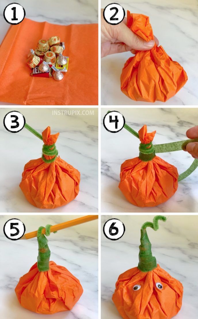 instructions to make an origami pumpkin with candy in the mouth and on top