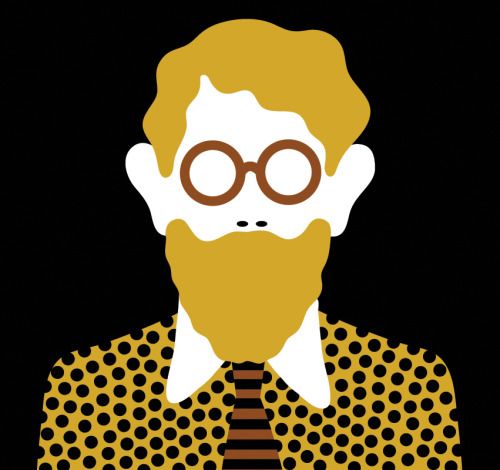 an image of a man with glasses and a beard wearing a polka dot shirt on black background