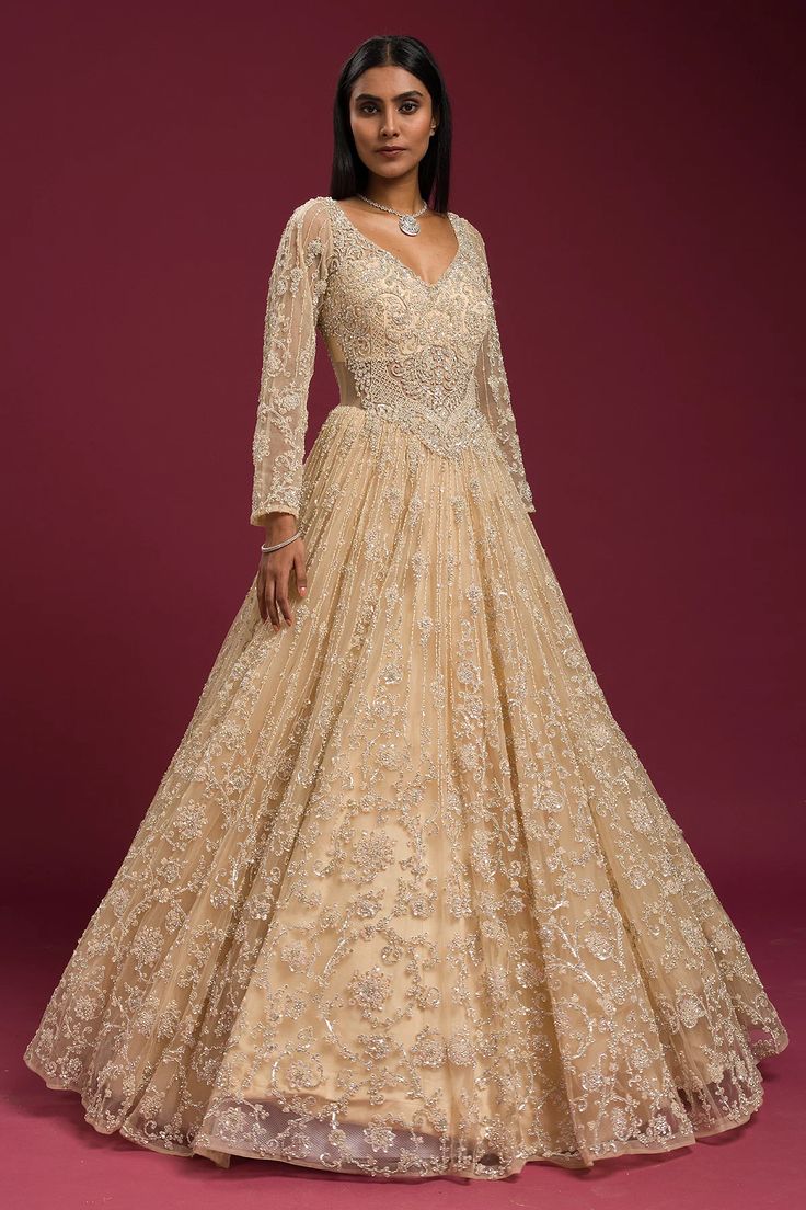 Cream evening gown, V-neck evening gown, Beaded evening gown, Net evening gown, Embroidered evening gown, Gown for Women, Gowns, Gown Design, Bridal Gown, Party Wear Gown Golden Gown Indian, Gold Anarkali Gown, Luxury Bollywood Gown With Gold Embroidery, Gold Dabka Floor-length Lehenga, Gold Bollywood Organza Gown, Net Gown Designs, Gowns Online Shopping, Net Gowns, Party Wear Gown