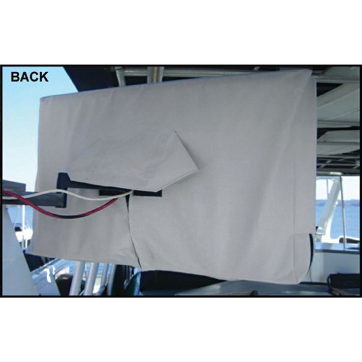 the back side of a boat with two pieces of white fabric hanging from it's sides