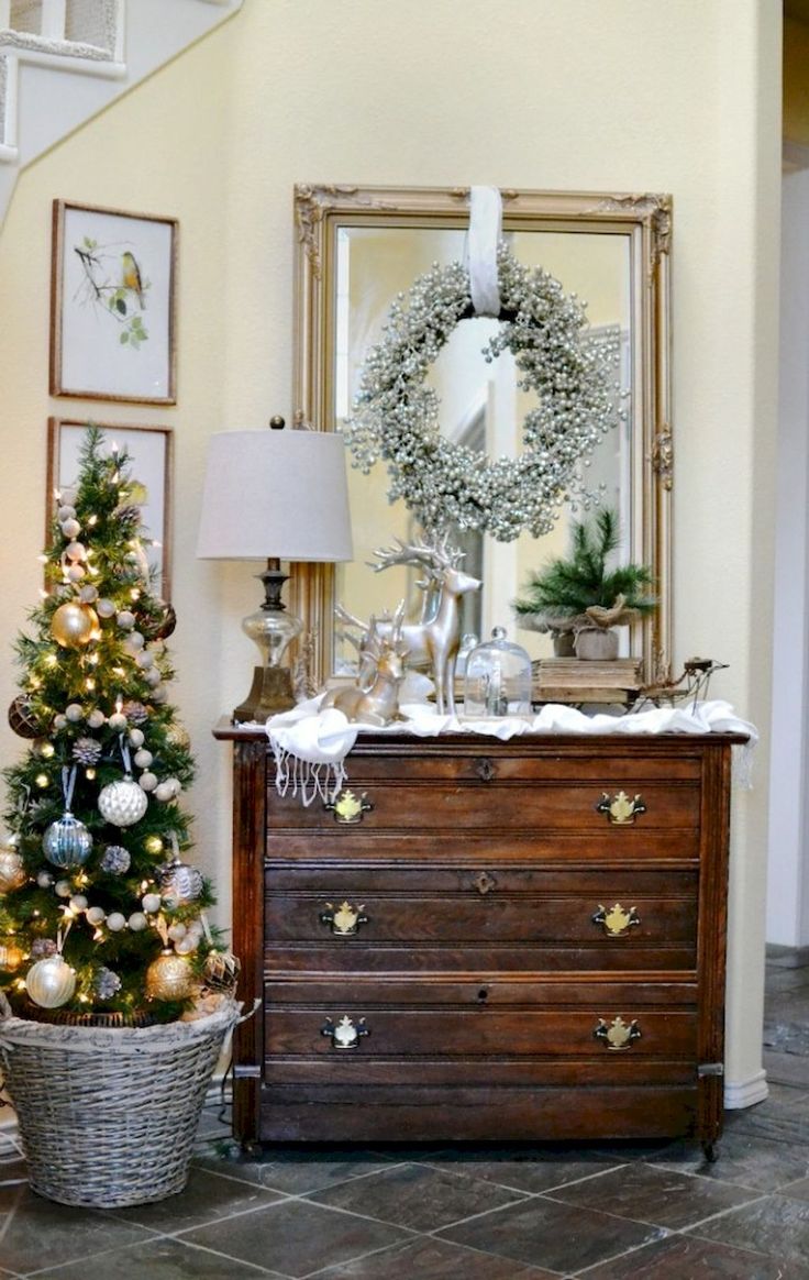 a living room with a christmas tree in the corner