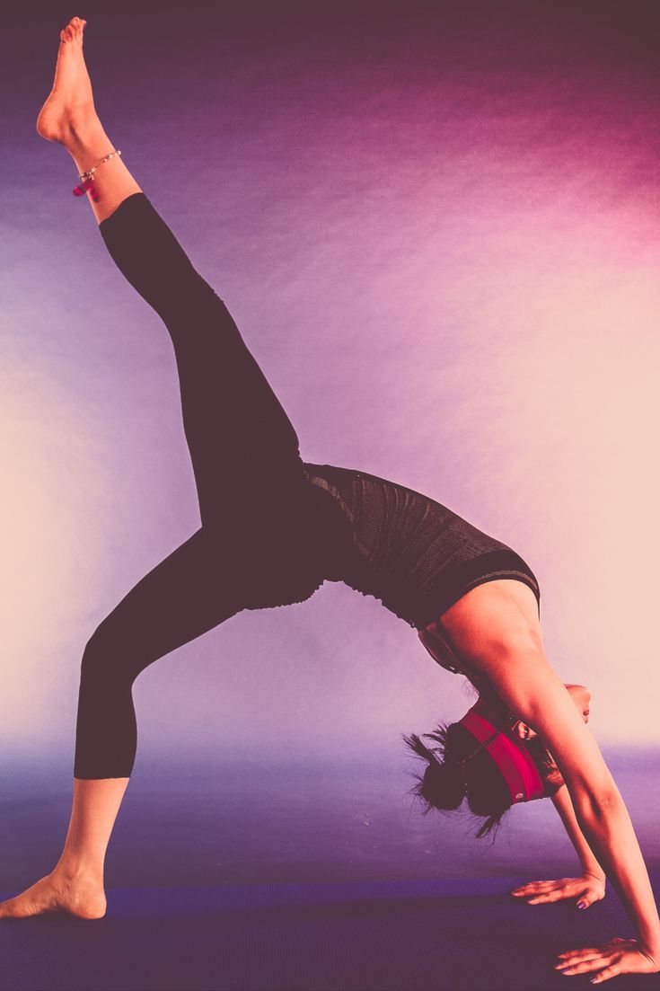 a woman doing a handstand in front of a purple background with the words food for thought