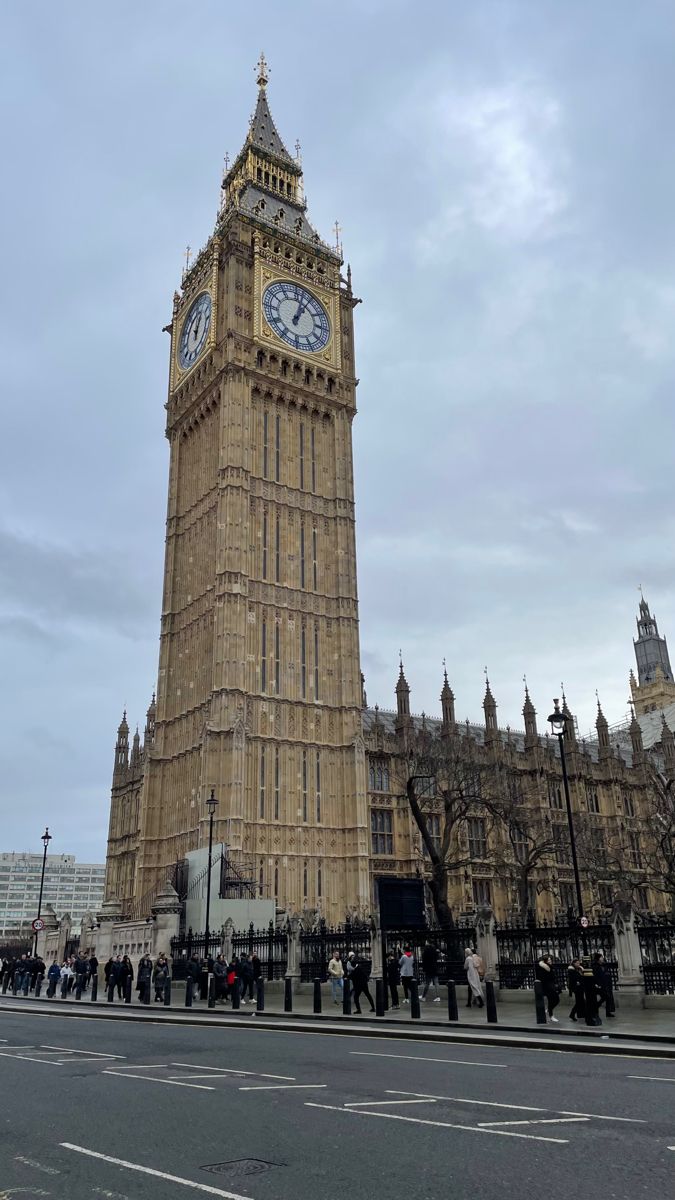 the big ben clock tower towering over the city of london