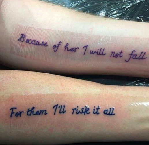 two people with tattoos on their arms that say, because of for i will not fall