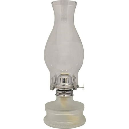 an old fashioned oil lamp on a white background