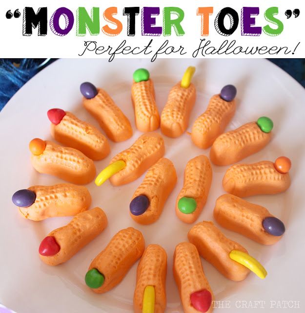 there is a white plate with candy corn on it and the words monster toe's perfect for halloween