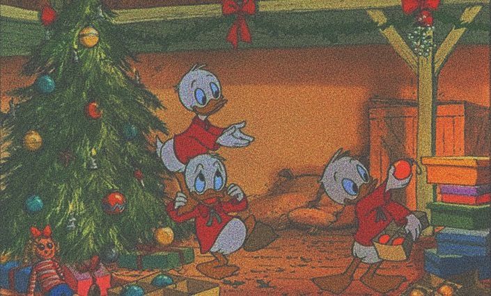 two cartoon characters are decorating a christmas tree