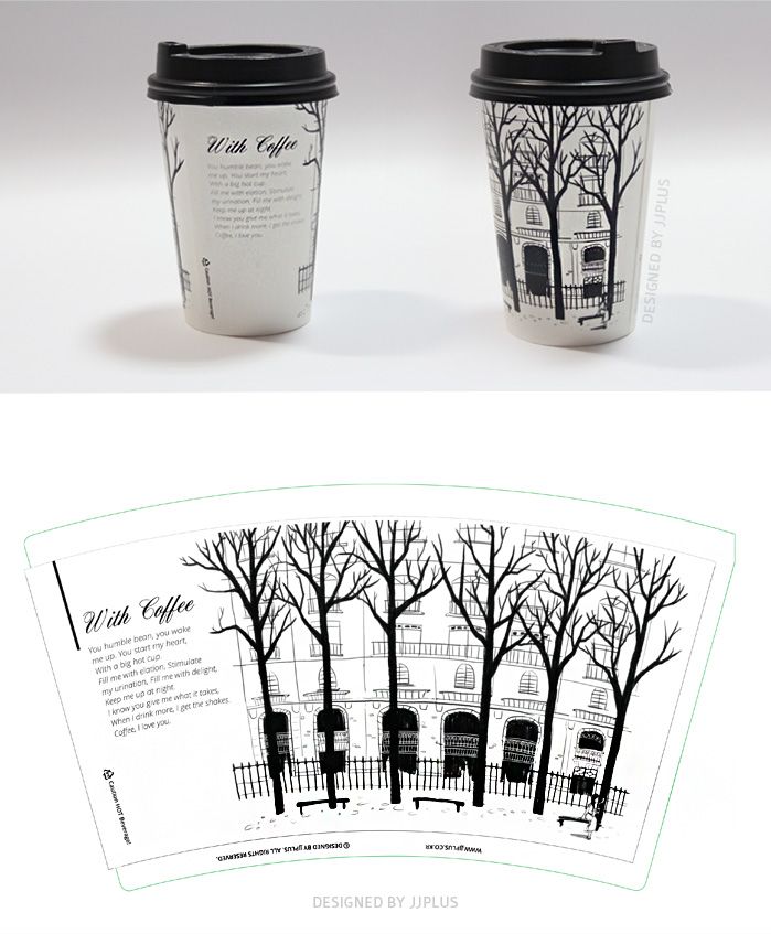 two coffee cups sitting next to each other on top of a white tablecloth with trees