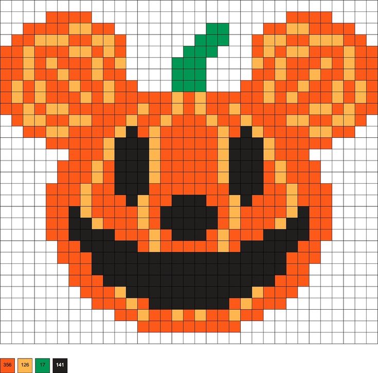 a cross stitch pattern with an image of a pumpkin in the shape of a face