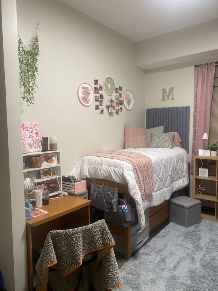 a bedroom with a bed, desk and shelves