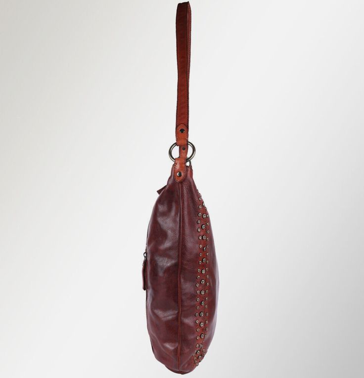 This American Darling hobo bag is handmade from the finest leathers available. Beautifully handcrafted leathers from Brazil, Argentina and Italy. Leather Hobo Bag With Leather Lining, Leather Hobo Bag With Pouch Shape, Leather Pouch Hobo Bag With Leather Handles, Leather Hobo Bag, Handcrafted Leather, Leather Hobo, Hobo Bag, Brazil, Genuine Leather