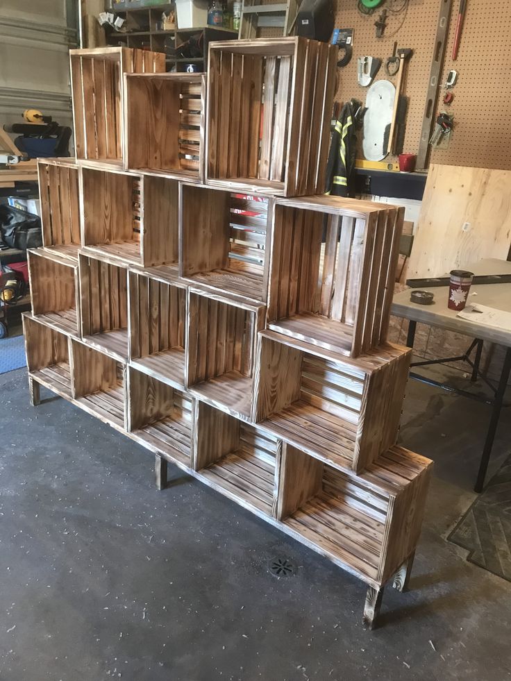 several wooden crates stacked on top of each other