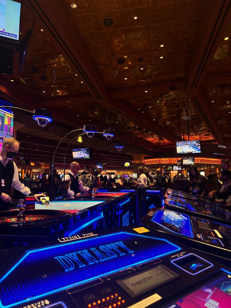 several people playing video games in a casino