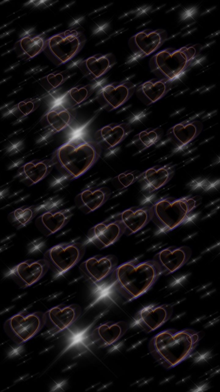 many hearts are floating in the air on a black background with white stars and sparkles