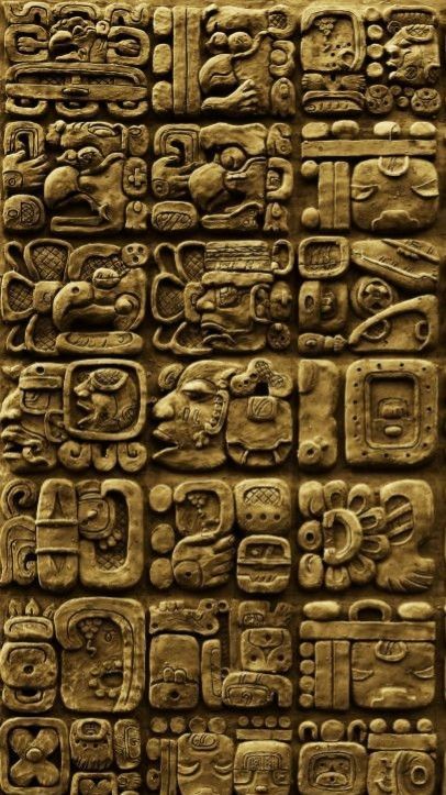 an intricately carved wall with many different designs