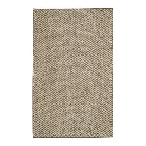 a beige rug with an intricate design on the bottom, and a diamond pattern in the middle