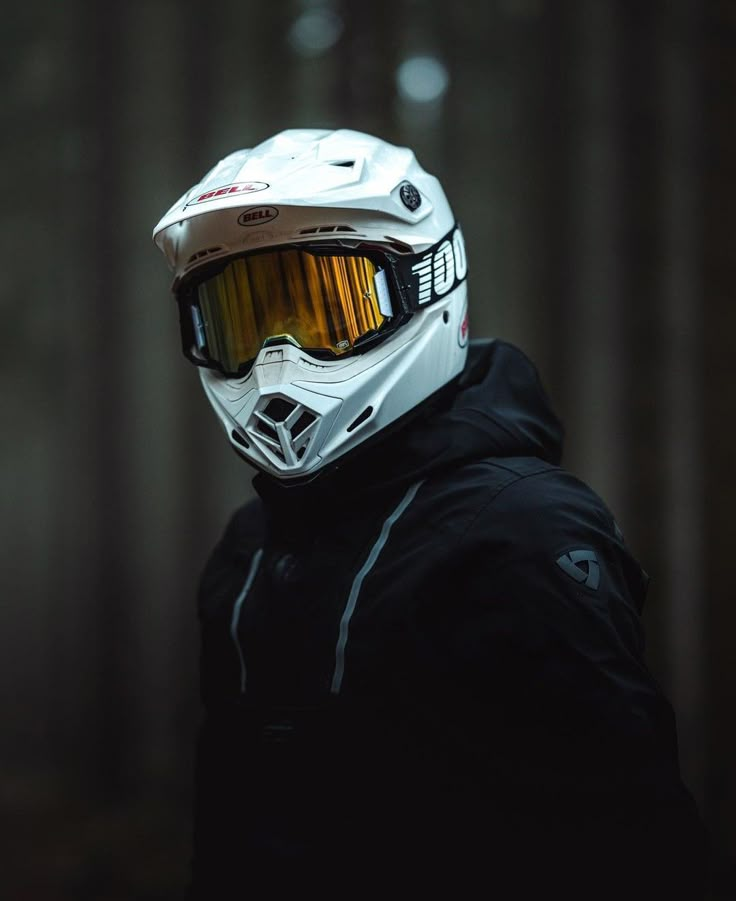 a person wearing a white helmet and goggles