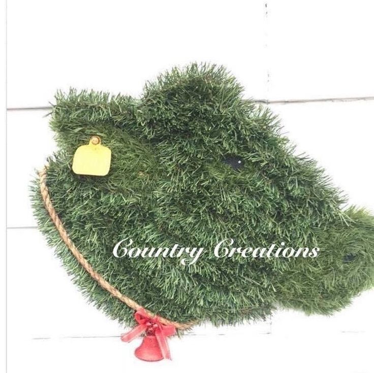 "My Cow wreath Is 19 1/2\"X 14\" and made to order in Brown City,MI. This wreath is made of artificial greens with a rope tail on a Wood backing. The wood is coated with a quality exterior paint. A wire has also been added for hanging. Would make a great gift for any cow lover."