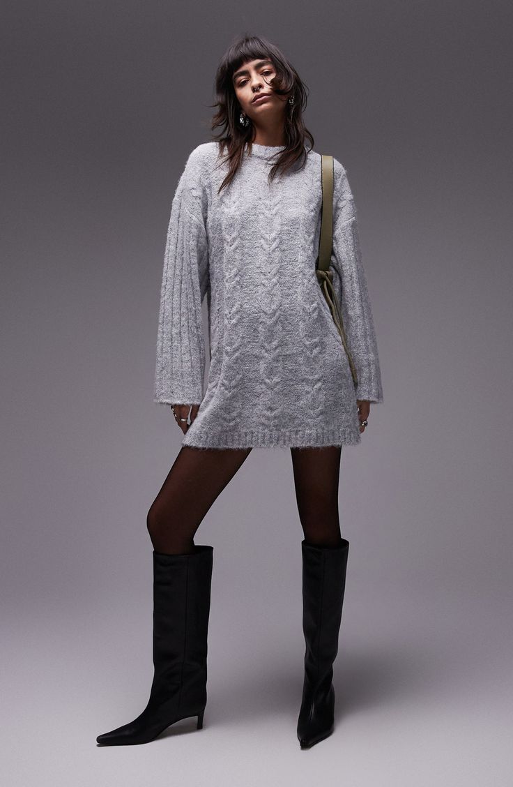 Embrace sweater weather without compromising on your 'fit in a cozy cabled minidress framed by boxy sleeves textured with wide-scale ribbing. Slips on over head Crewneck Long sleeves 48% polyester, 36% nylon, 16% acrylic Machine wash, dry flat Imported Grey Sweater Winter Outfit, Winter Dress Outfit Casual, Boots And Sweater Dress, Grey Sweater Dress Outfit, Winter Sweater Dress Outfit, Sweaterdress Styling, Midi Sweater Dress Outfit, Knit Sweater Dress Outfit, Gray Sweater Dress Outfit