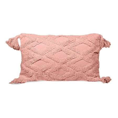 a pink pillow with tassels on it