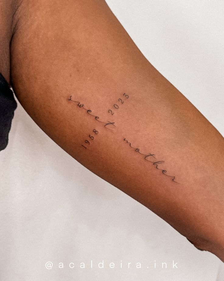 a woman's arm with writing on it