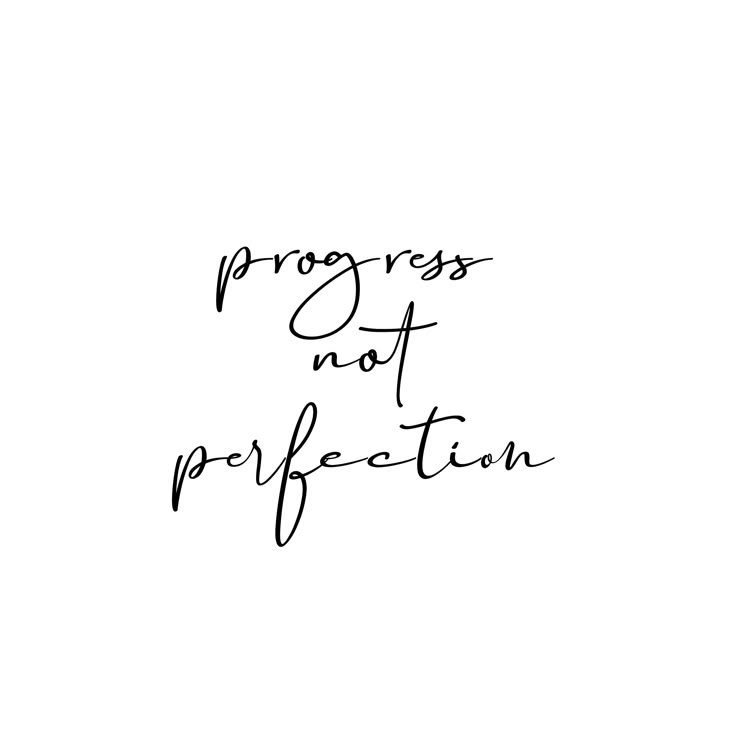 the words progress not perfection written in black ink