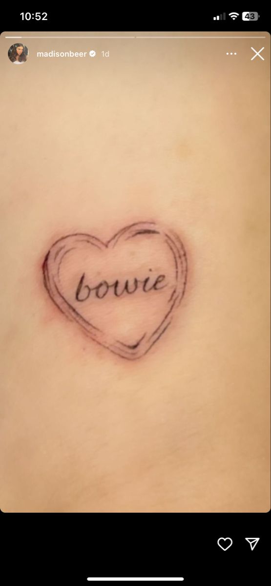 a small heart with the word bowie written on it in cursive font