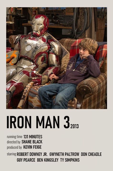 the poster for iron man 3 is shown with two men sitting on a couch in front of them