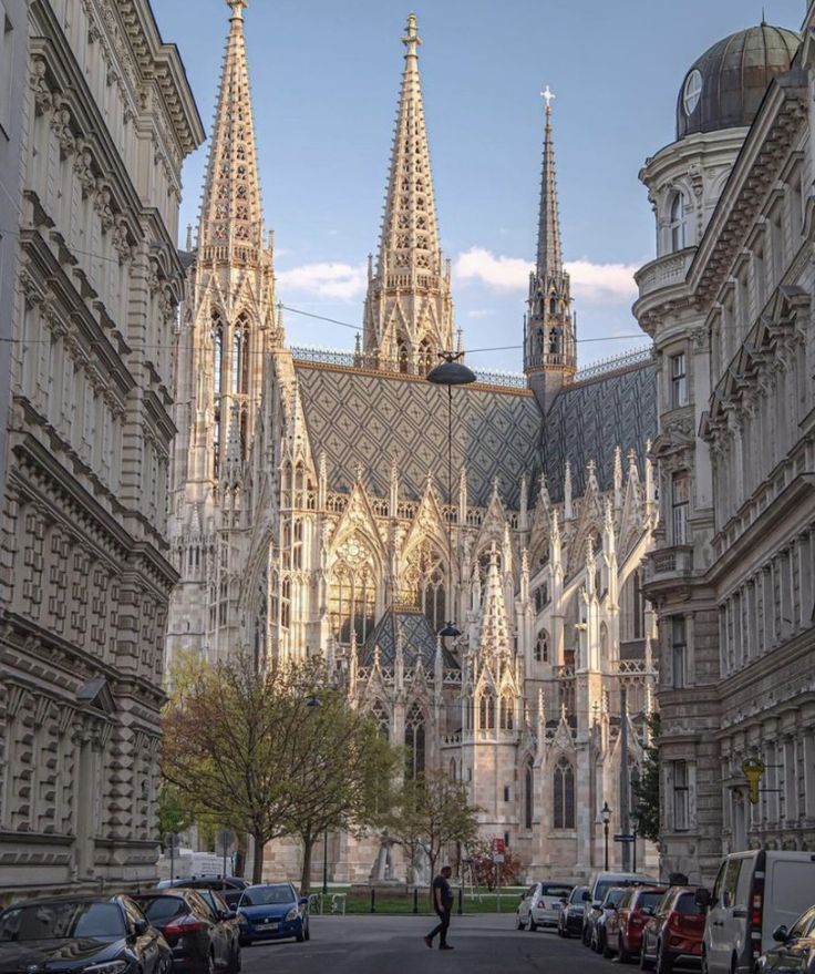 the large cathedral has many spires on it's sides