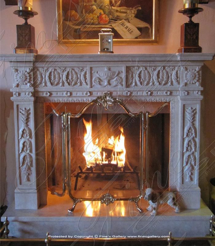 a fire place with a painting on the wall