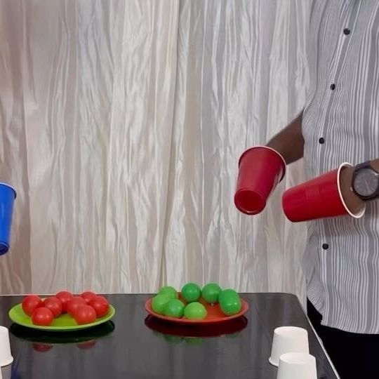 a man is pouring candy into two plates