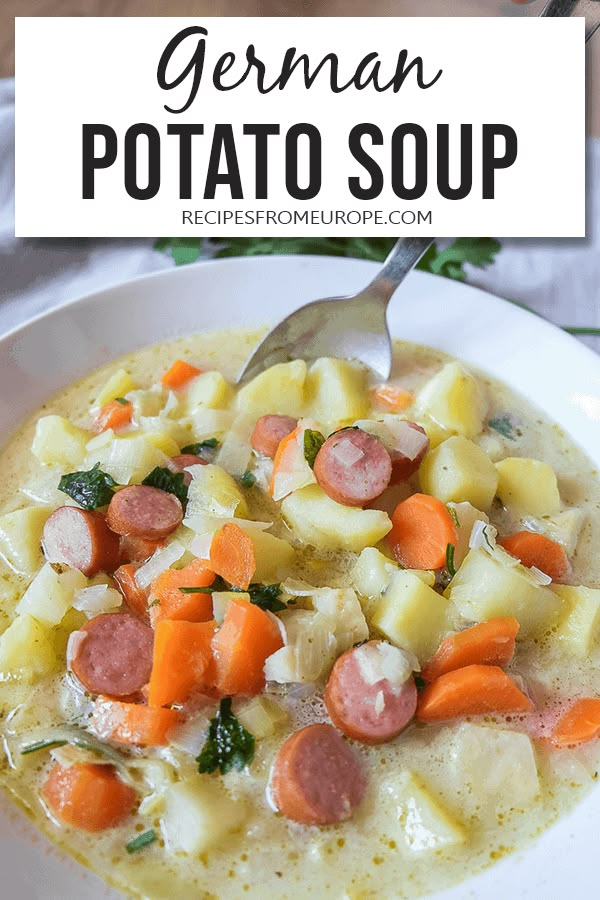 a bowl of german potato soup with a spoon in it and the title overlay reads,